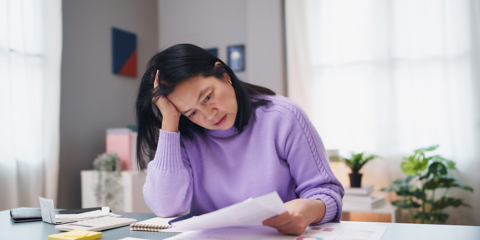 Looking at paperwork stressed