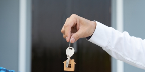 Handing over keys to house