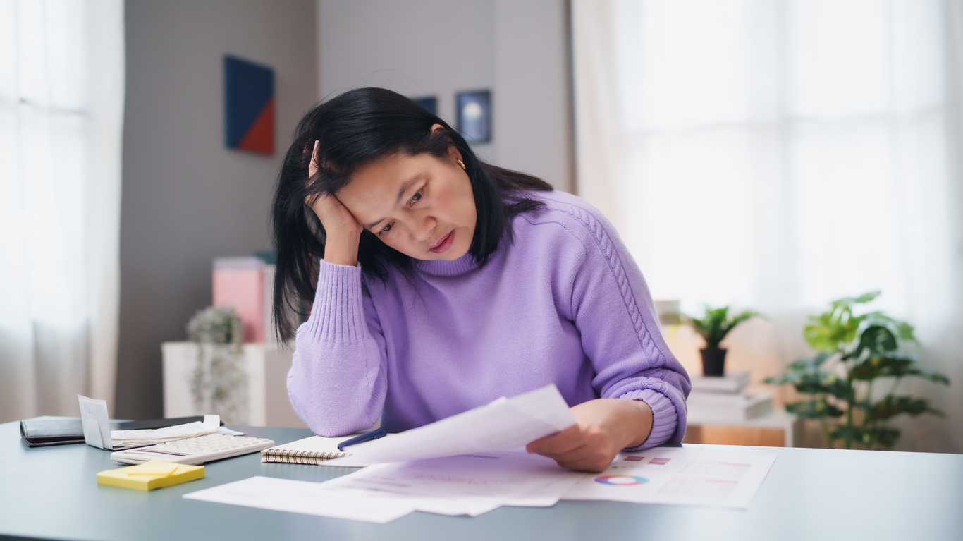 Looking at paperwork stressed