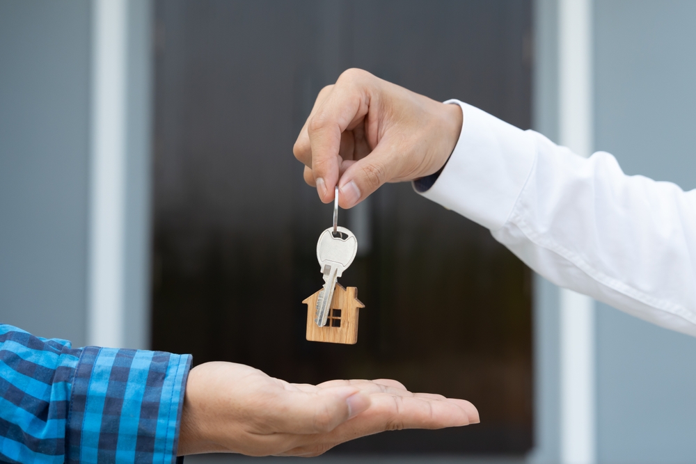 Handing over keys to house